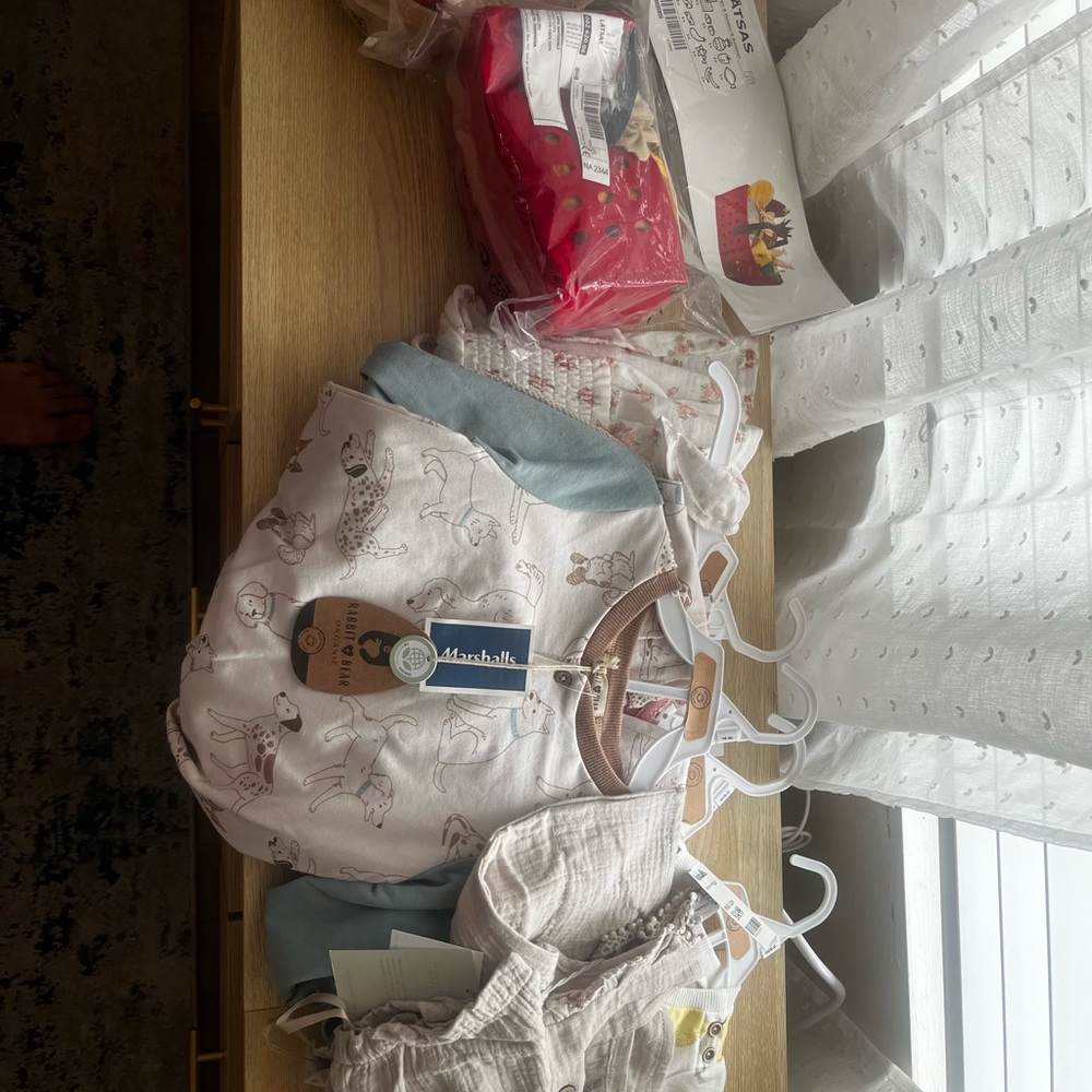Organic baby clothes and plush toy bundle